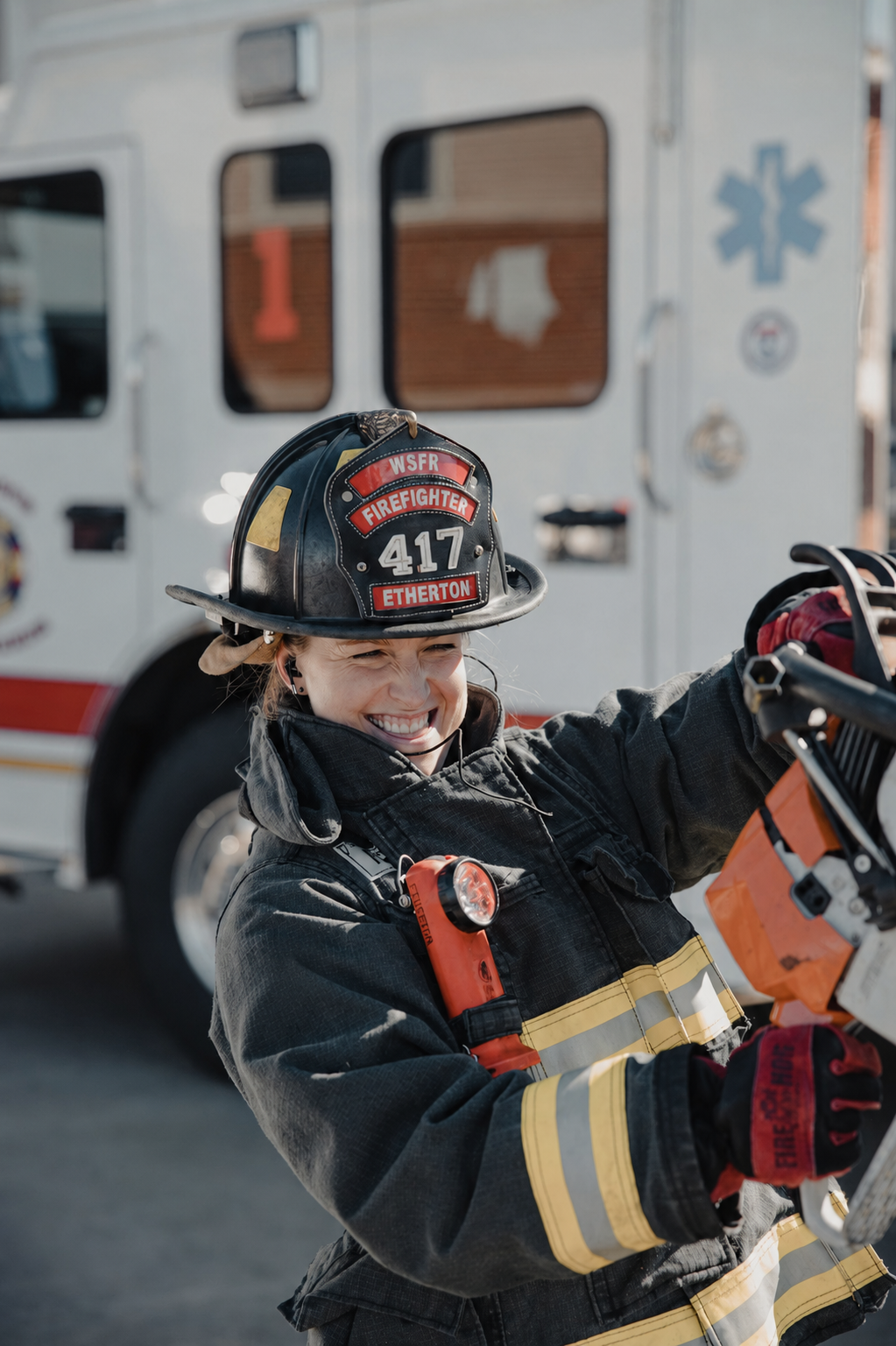 Firefighter wearing a protective helmet